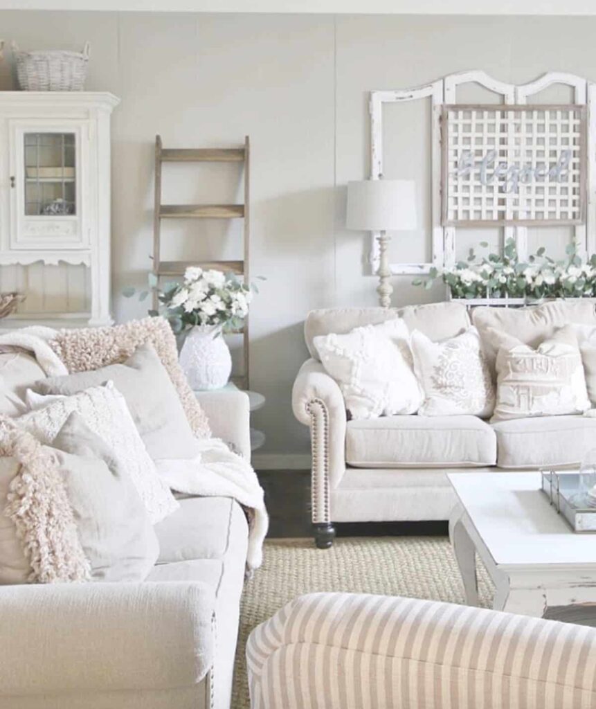 Bright shabby chic-inspired living room with off-white color palette and Mindful Gray walls.