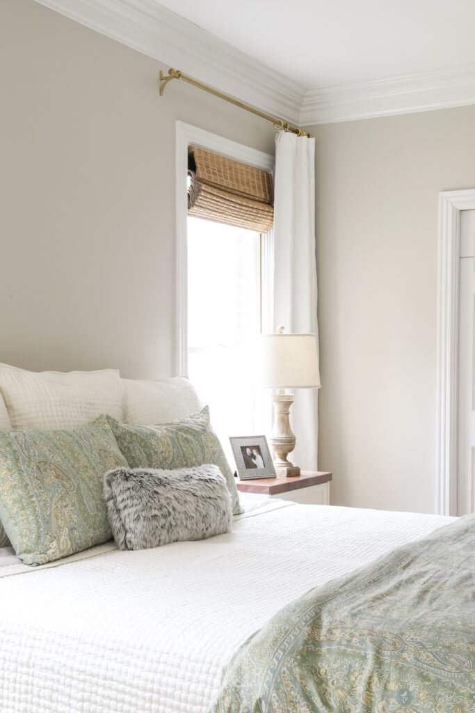 Bamboo Shades and Ivory Curtains in the Master Bedroom