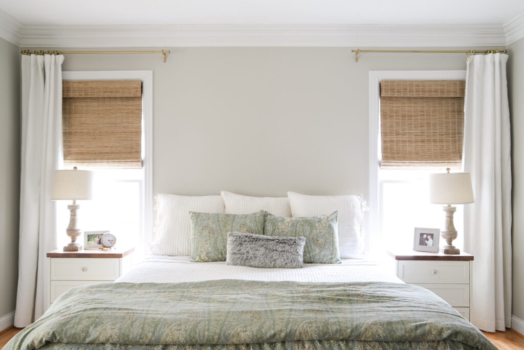 King size bed with bamboo shades and curtains