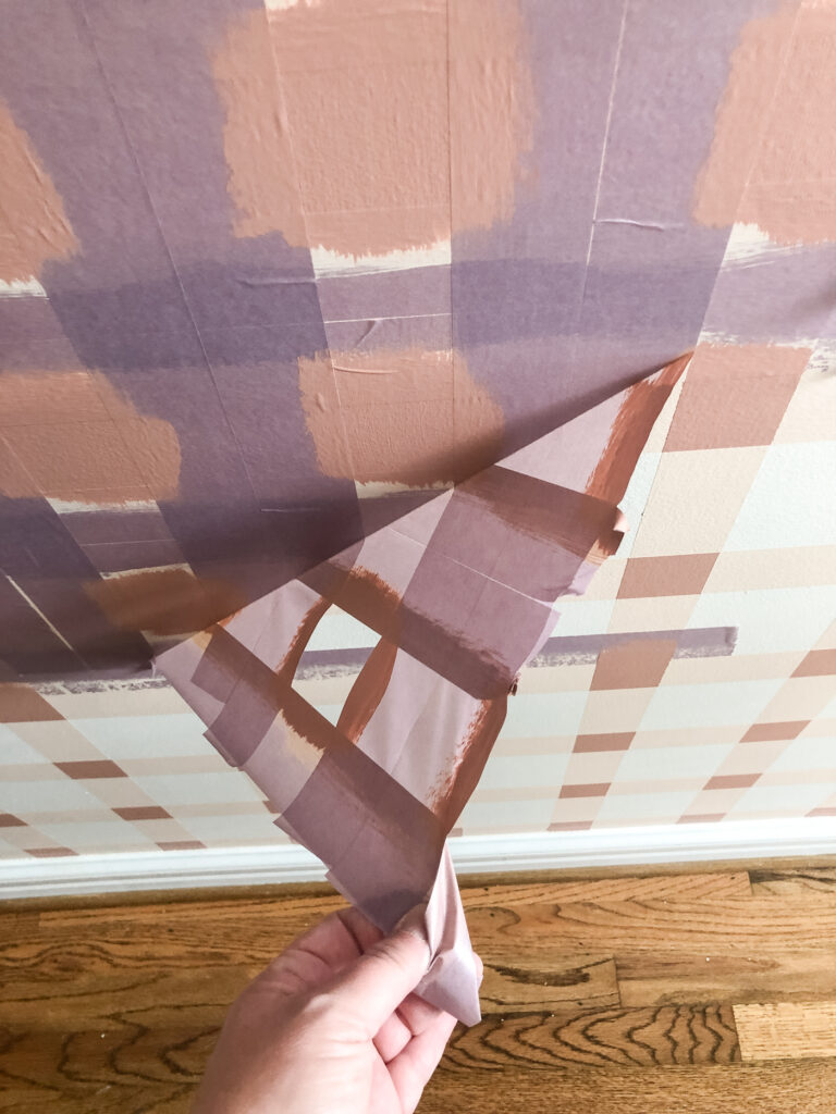 Remove tape on painted plaid wall