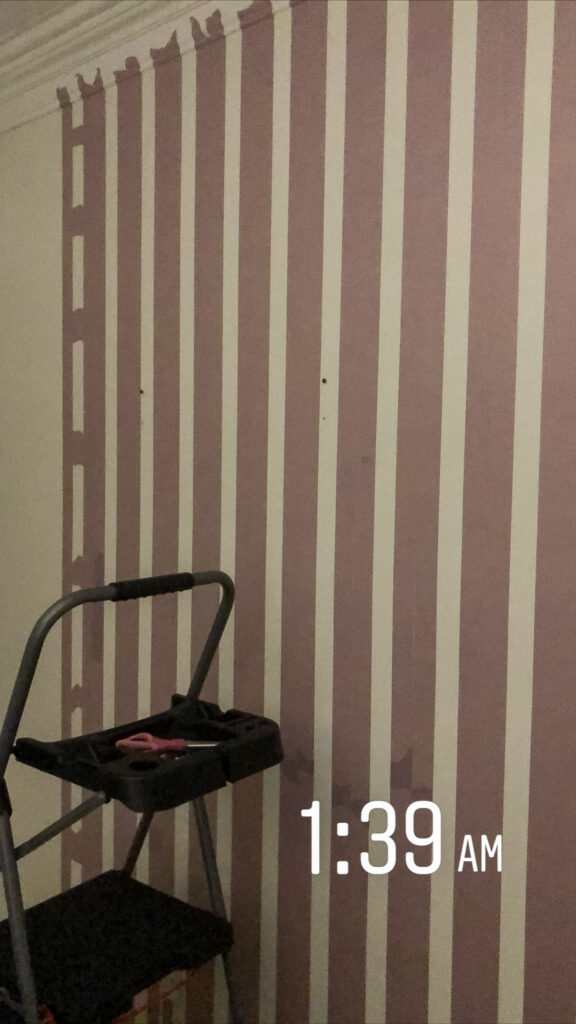 Tape lines for plaid painted wall