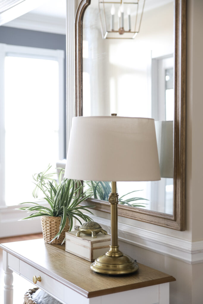 Table Lamp & Mirror in the Foyer