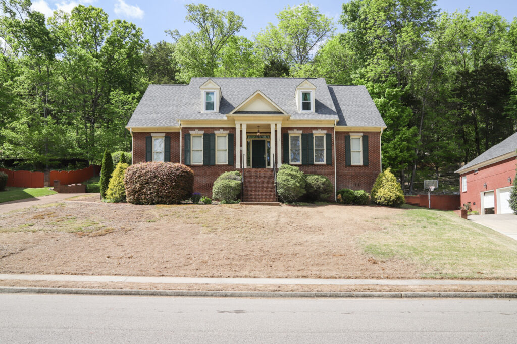 Our Brick House Exterior Makeover (White Trim & Black Shutters)