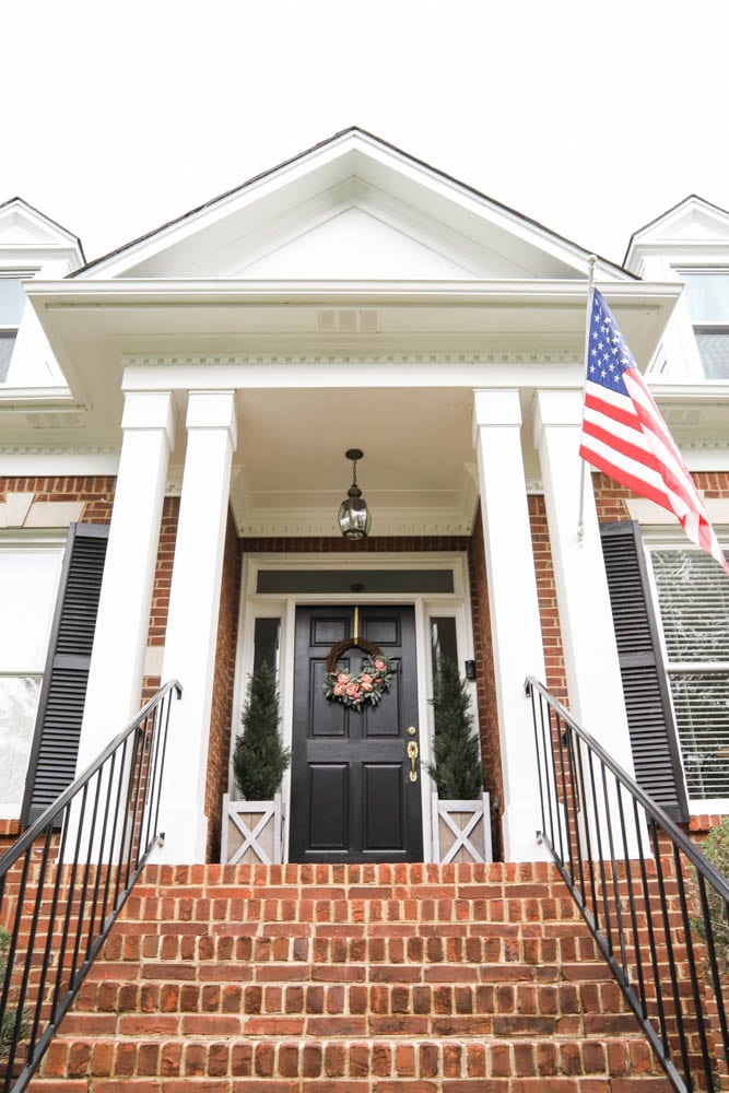 White Painted Porch and Brick House