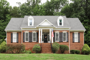 Our Brick House Exterior Makeover (White Trim & Black Shutters)