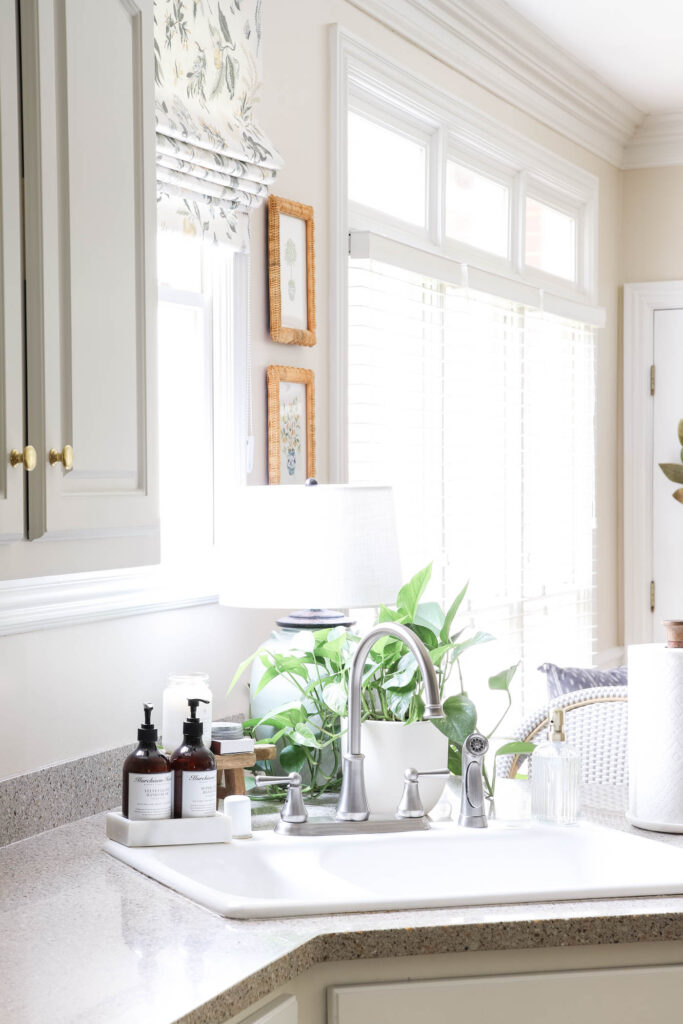 White Sink, Marble Soap Tray and Lamp Behind Sink