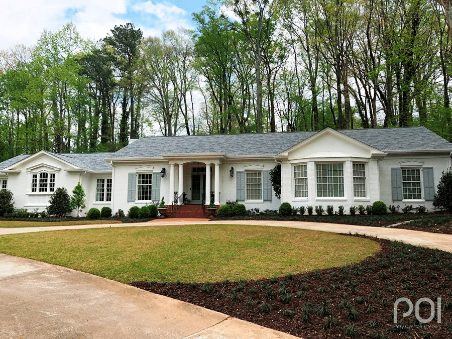 House painted Sherwin Williams Alabaster with a gray roof