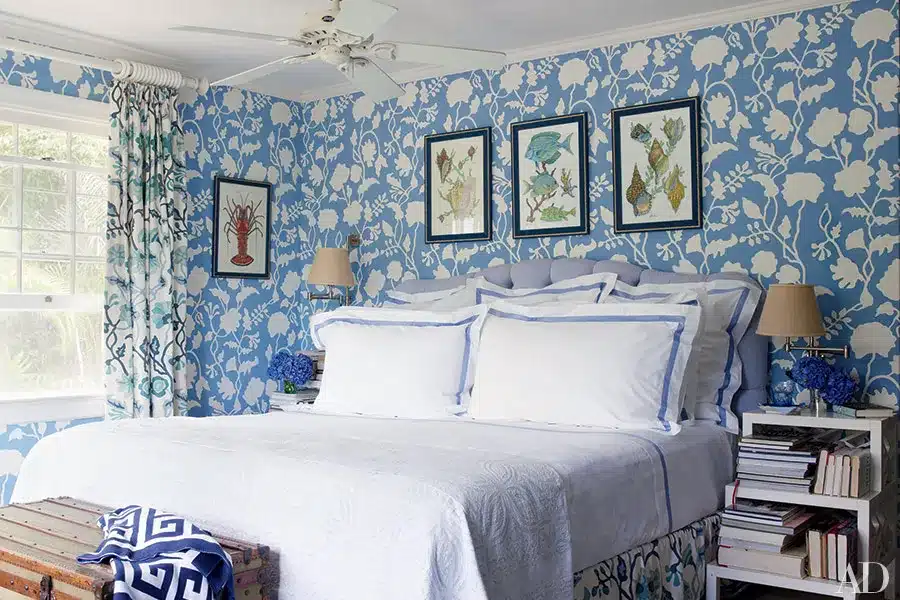 blue master bedroom in a Bahamas cottage by Andrew Raquet Interior Design