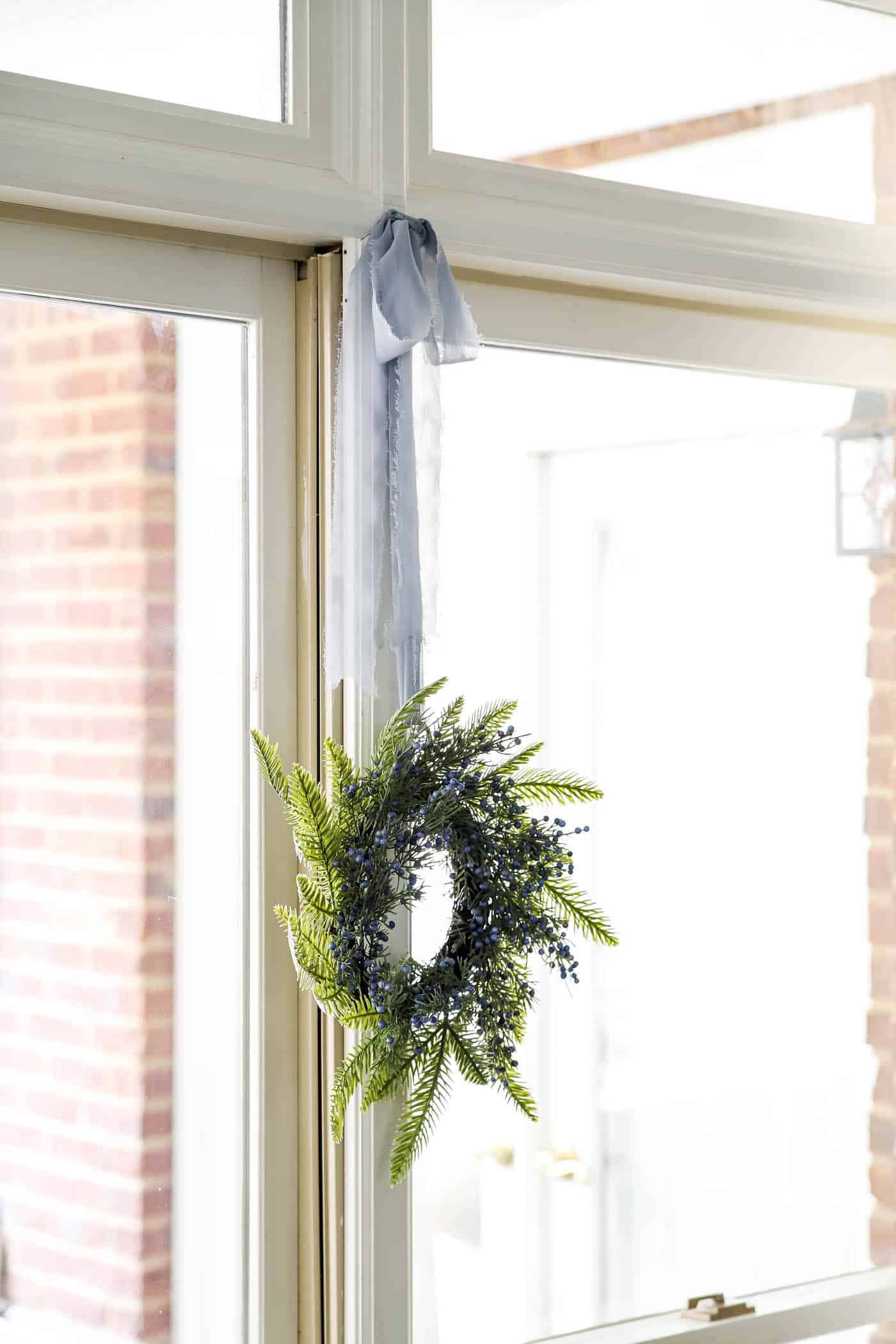 Pine and Berry Wreaths in Window