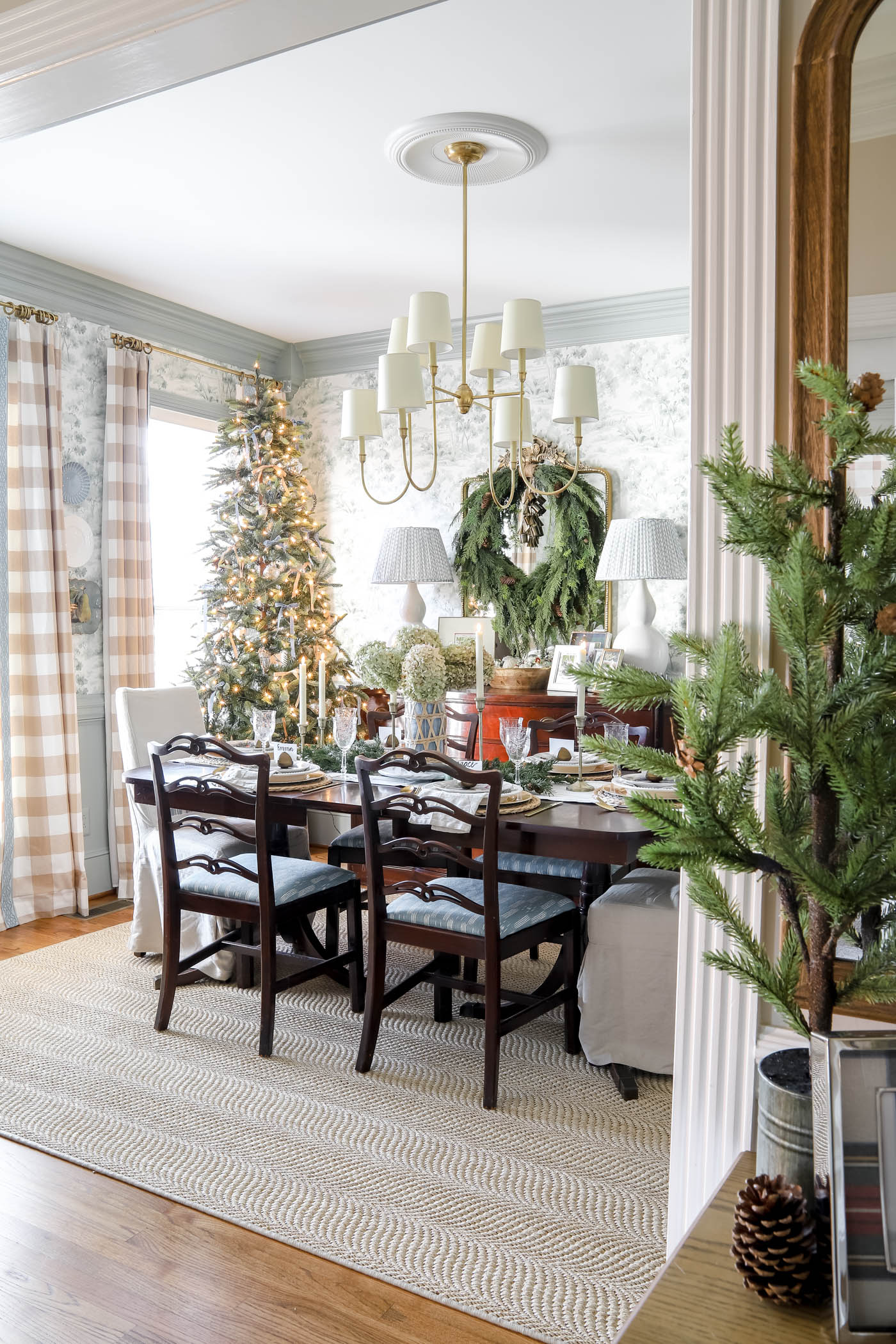 blue and green dining room decorated for Christmas