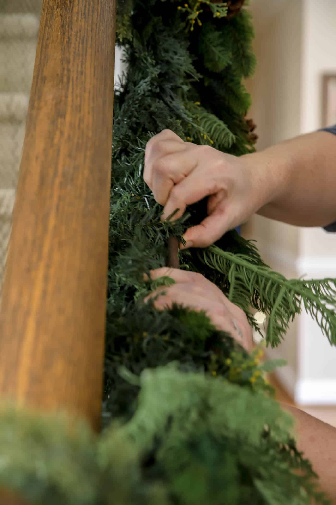 how to add garland to the stairs