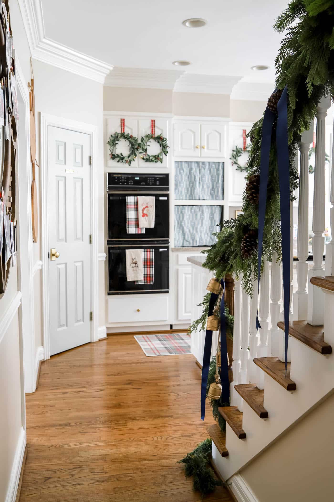 faux garland on a stair banister
