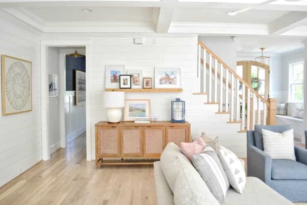 white shiplap walls in living room