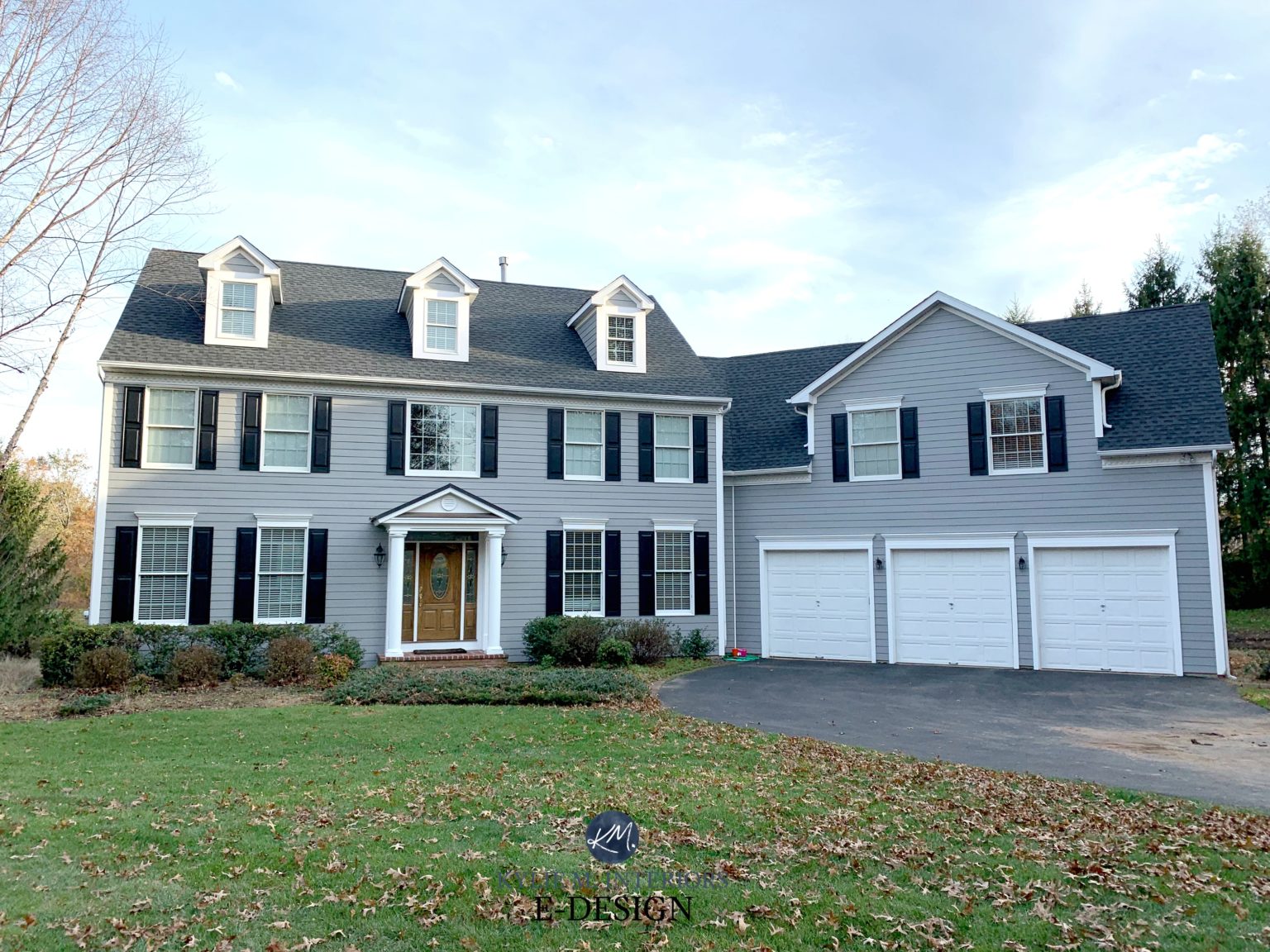 home exterior with gray body, black shutters, and Sherwin Williams Extra White trim