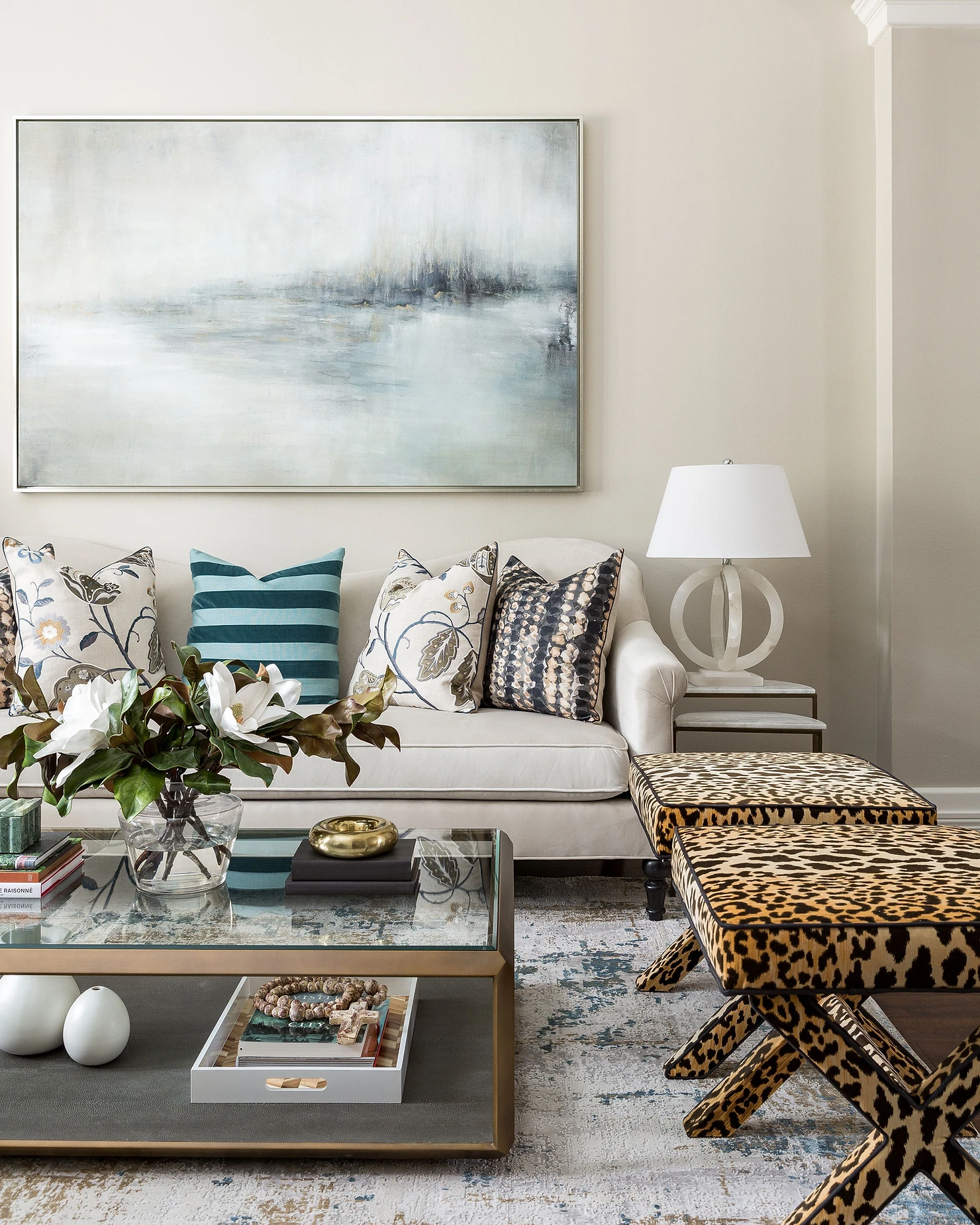 living room with bold patterned decor and greige walls