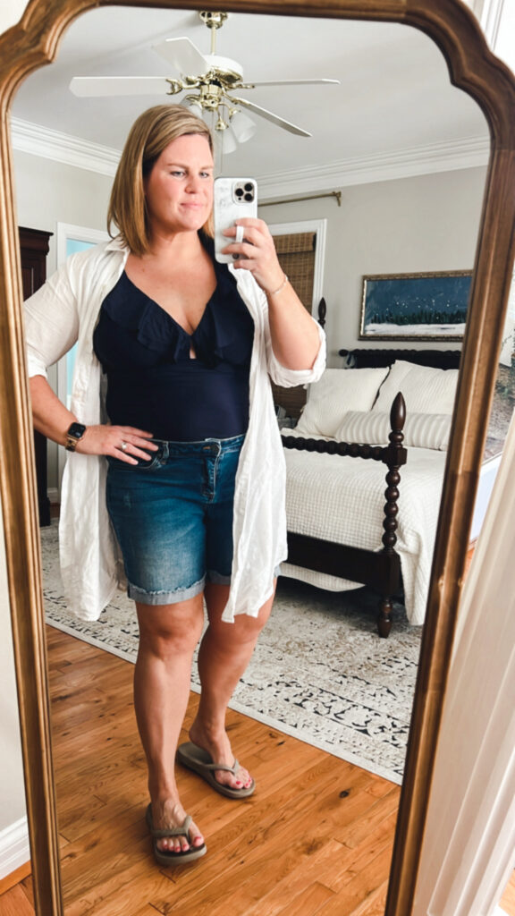 J crew navy swimsuit and white button down cover up with jeans