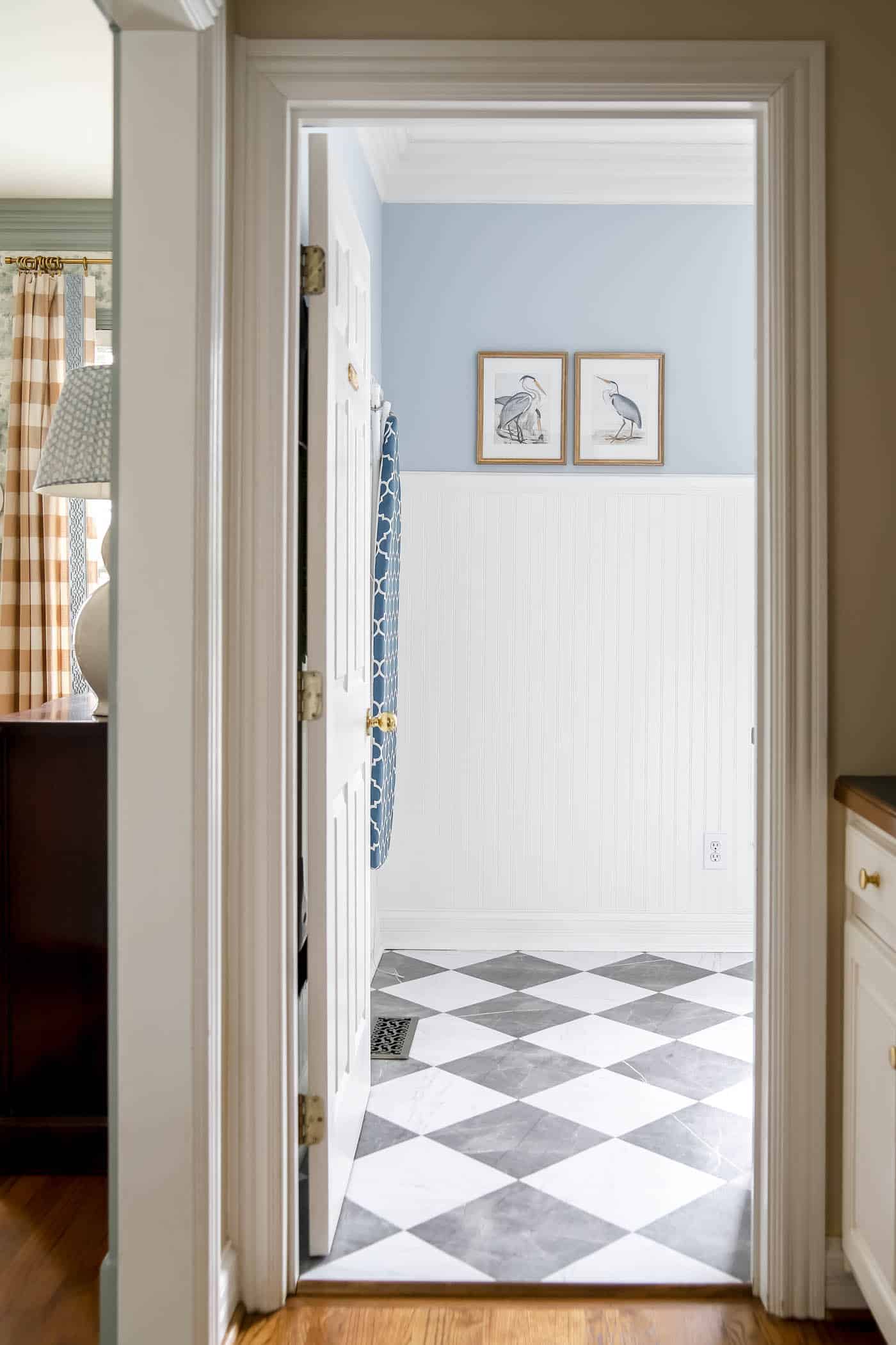 simply white bead board in laundry room