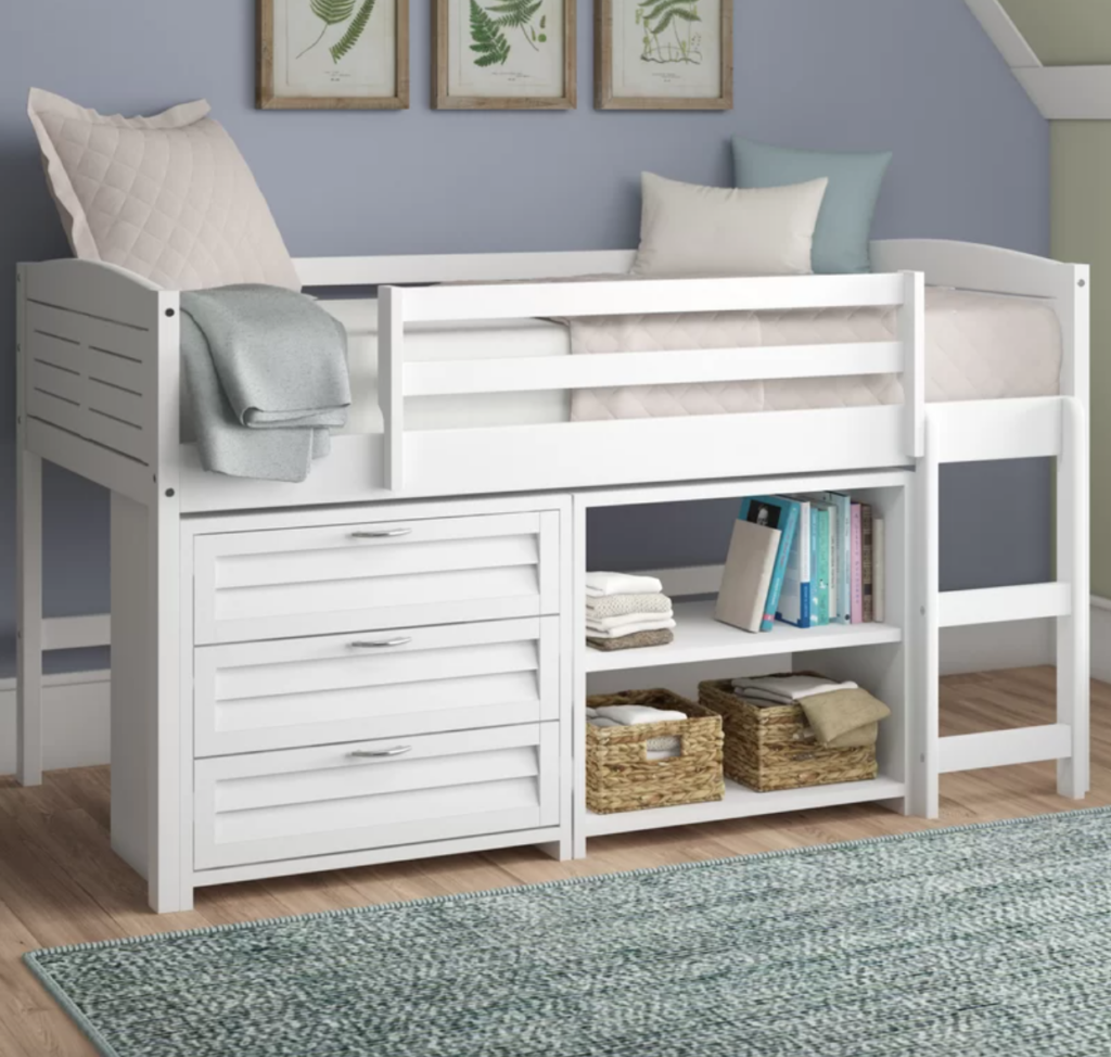 Twin raised bed with shelves and drawers for storage