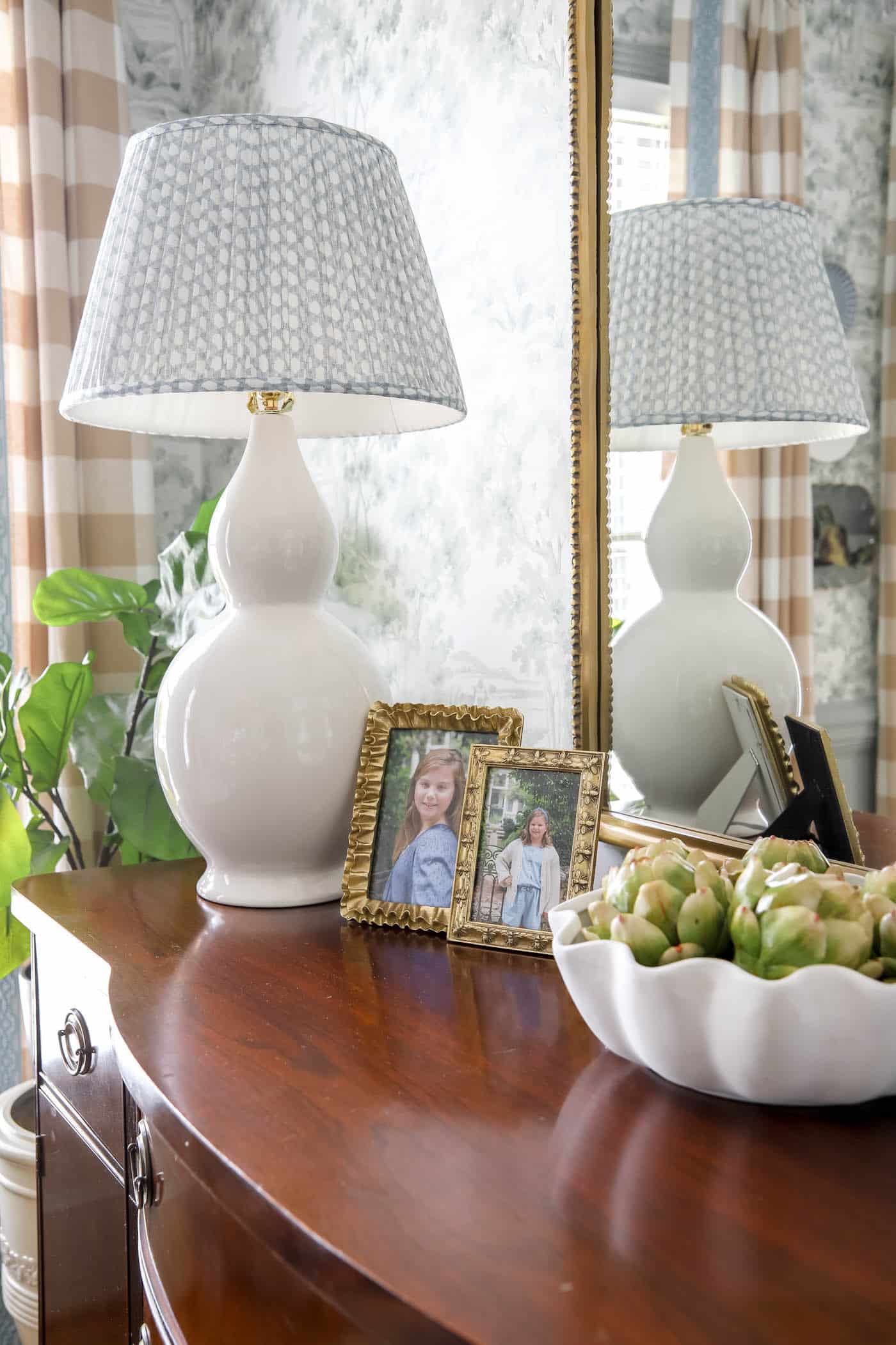 Faux artichokes in a bowl for spring dining room decor