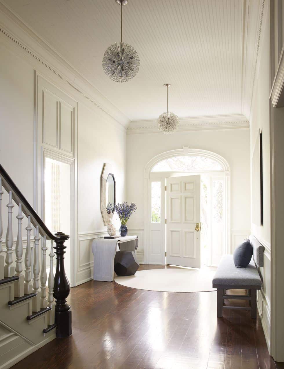 entryway with round rug