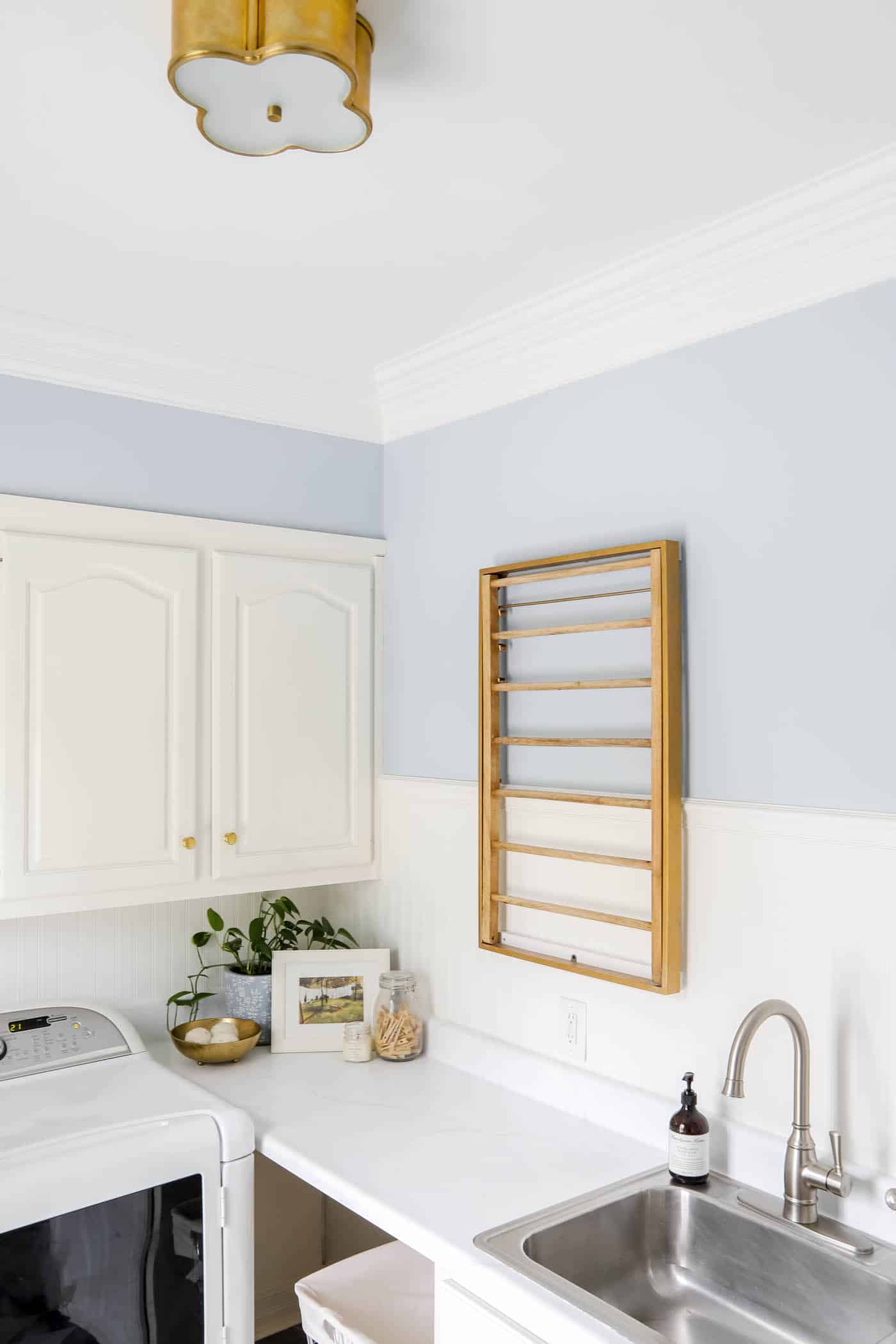 blue and white laundry room corner