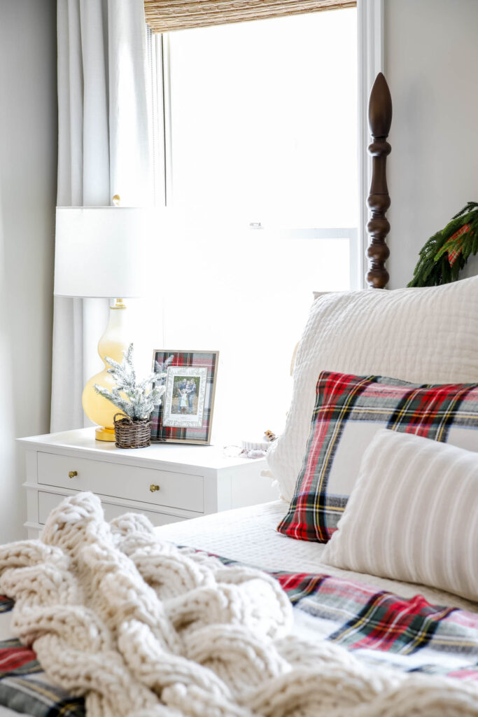Add pretty frames to bedroom nightstands for Christmas