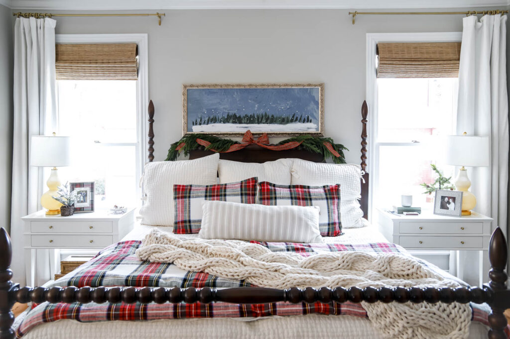 Wide view of Christmas bedroom with holiday bedding