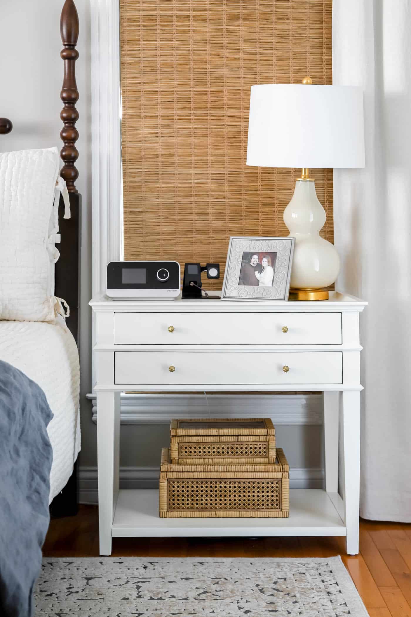 clutter-free white bedside table