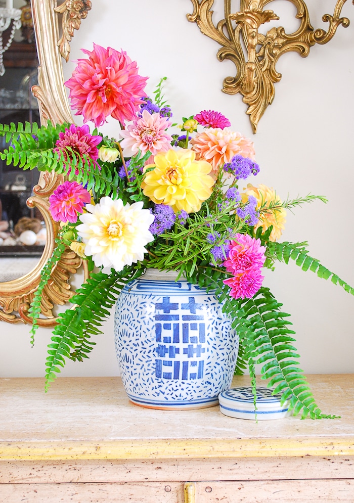 ginger jar vase with vibrant flowers