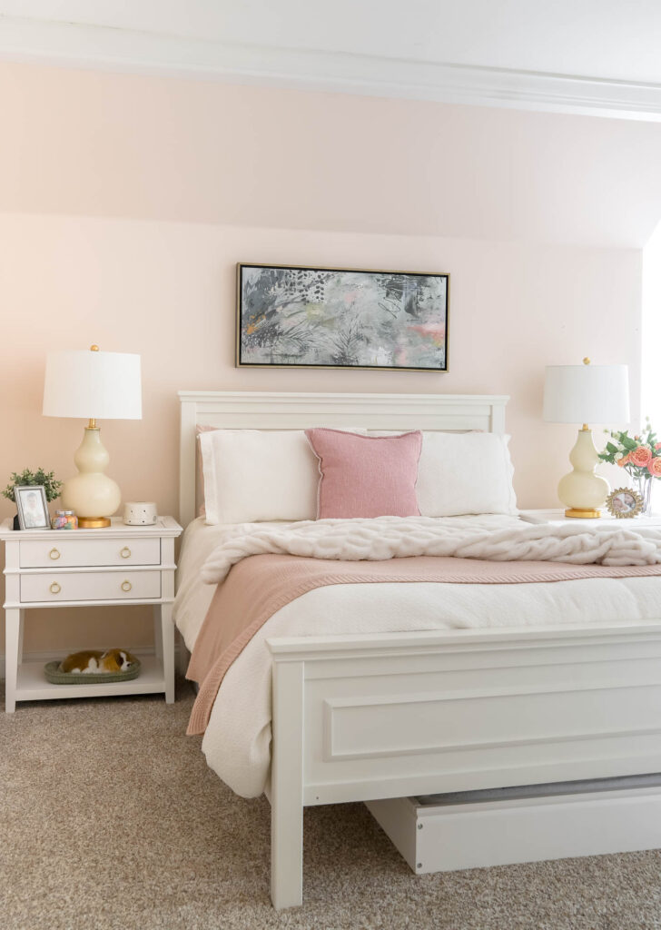 white full size bed with white nightstands and gold hardware in a teen girl bedroom.