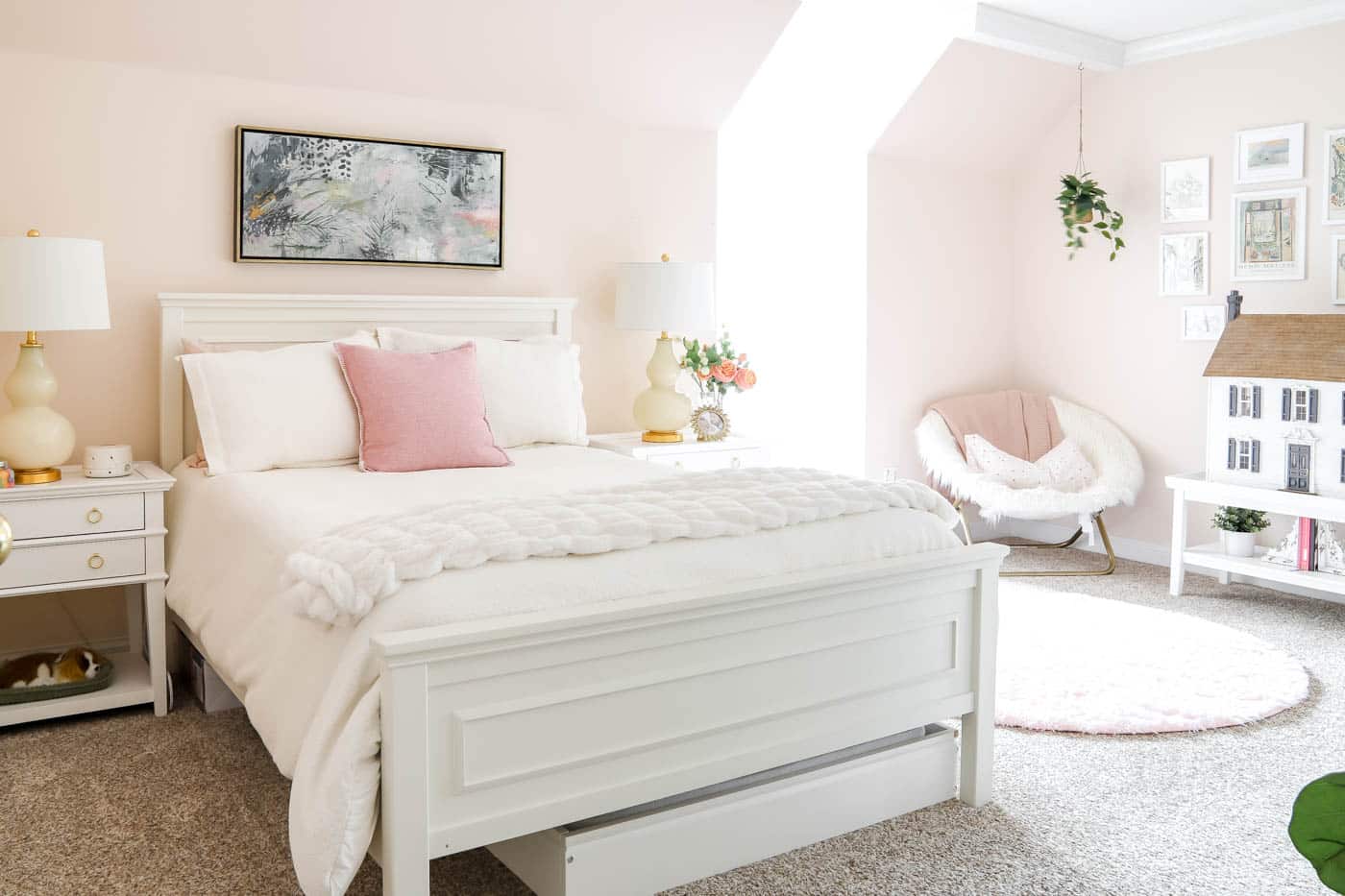 white full size bed with white nightstands and gold hardware in a teen girl bedroom.