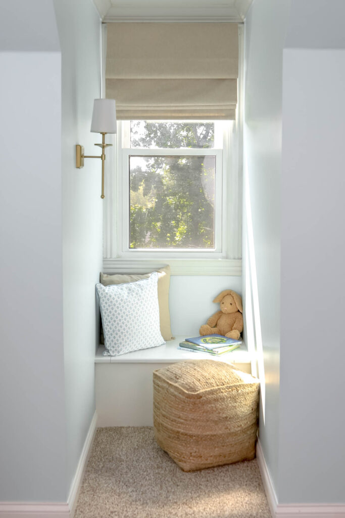 Coastal theme Reading Nook with Tidewater paint on the walls.