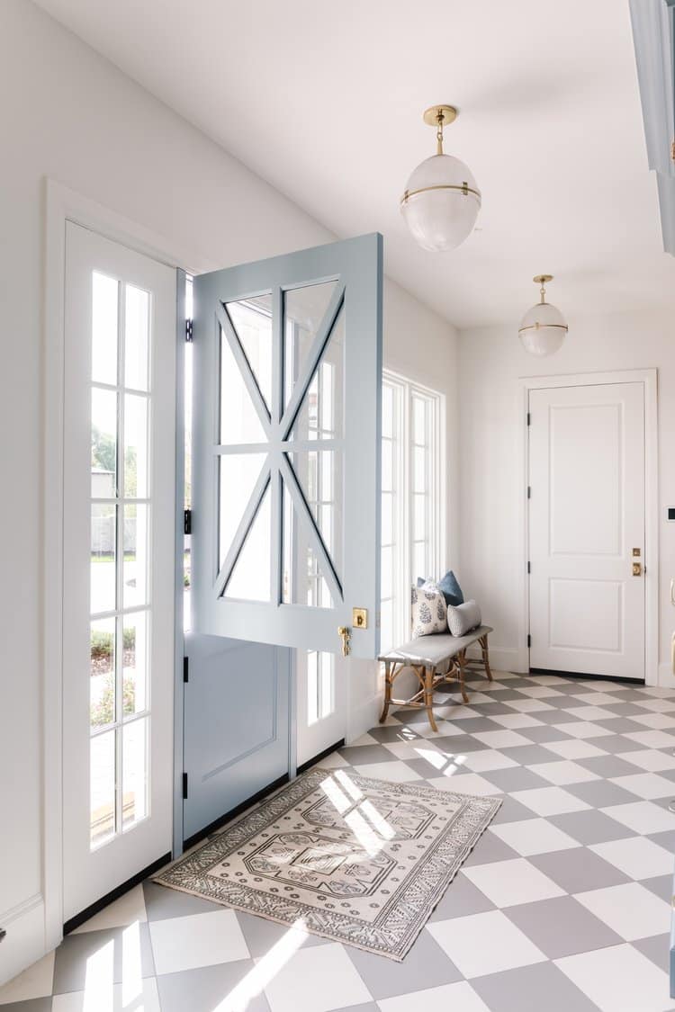 Light blue and white checkered floors in an entry way. 