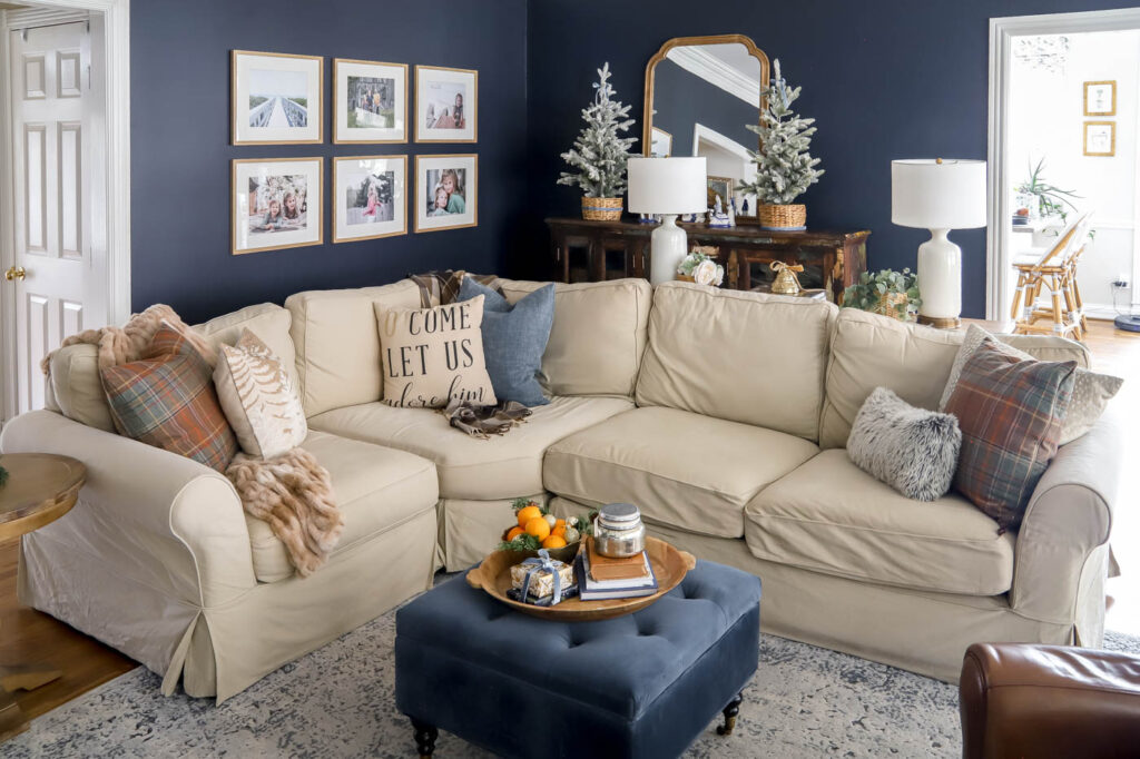 neutral sectional sofa with neutral Christmas pillows.