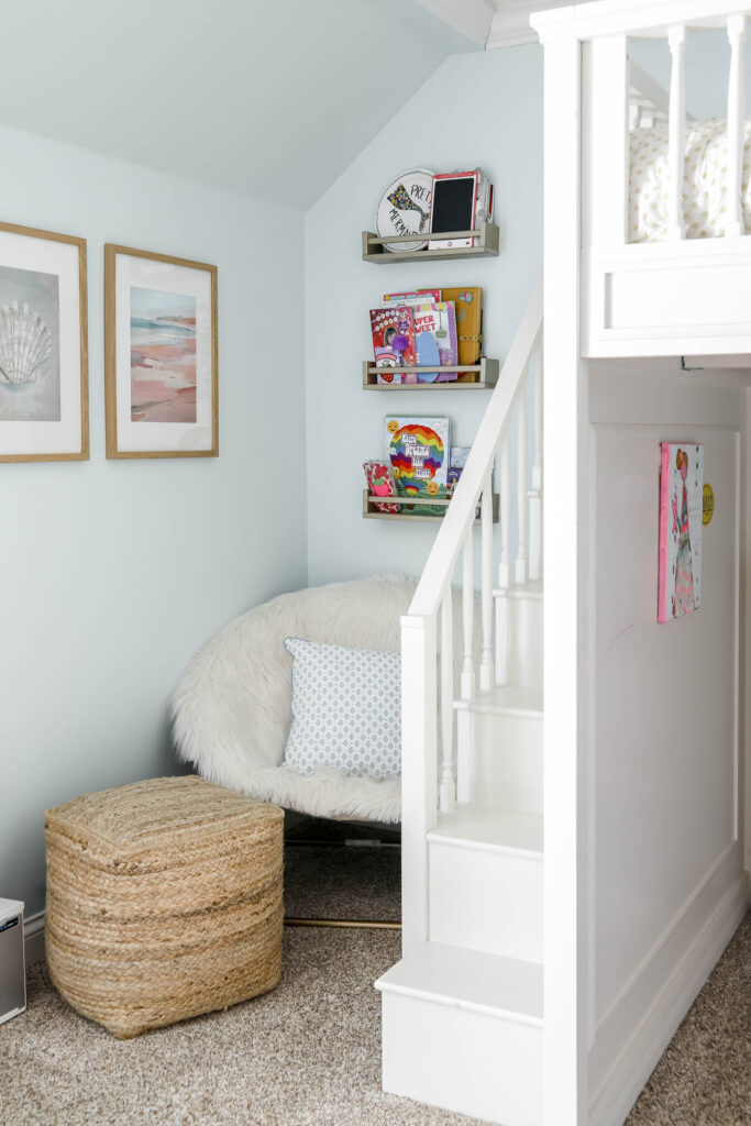Corner beyond the loft bed in a girls room.
