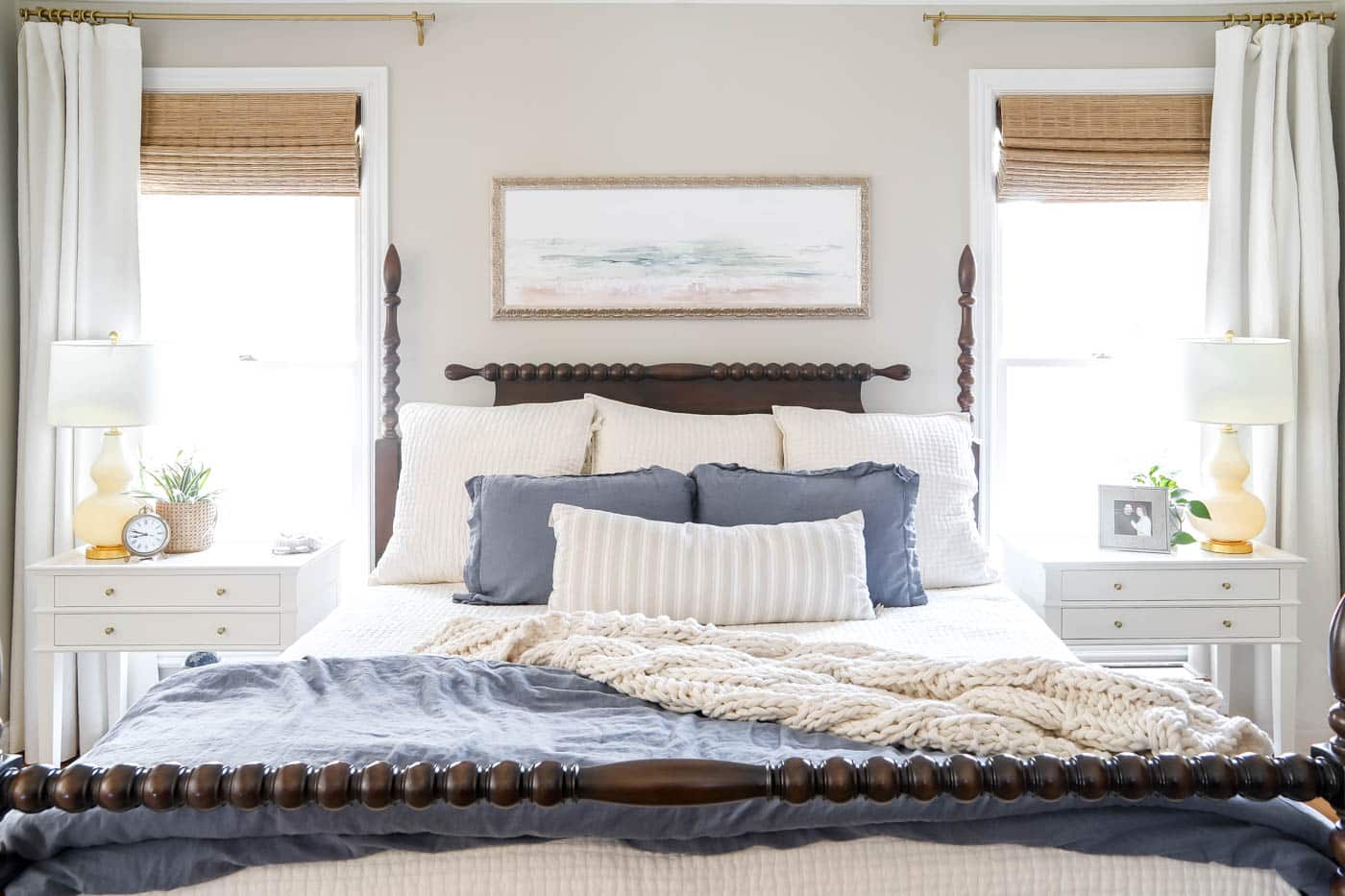 primary bedroom straight on with symmetrical nightstands.