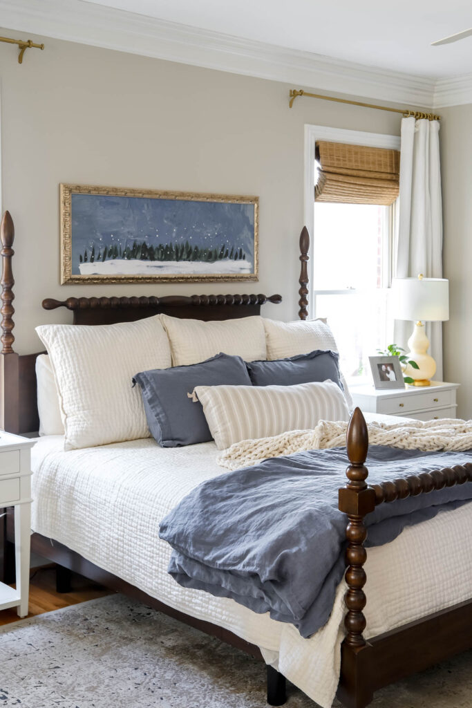 primary bedroom with winter art over the bed