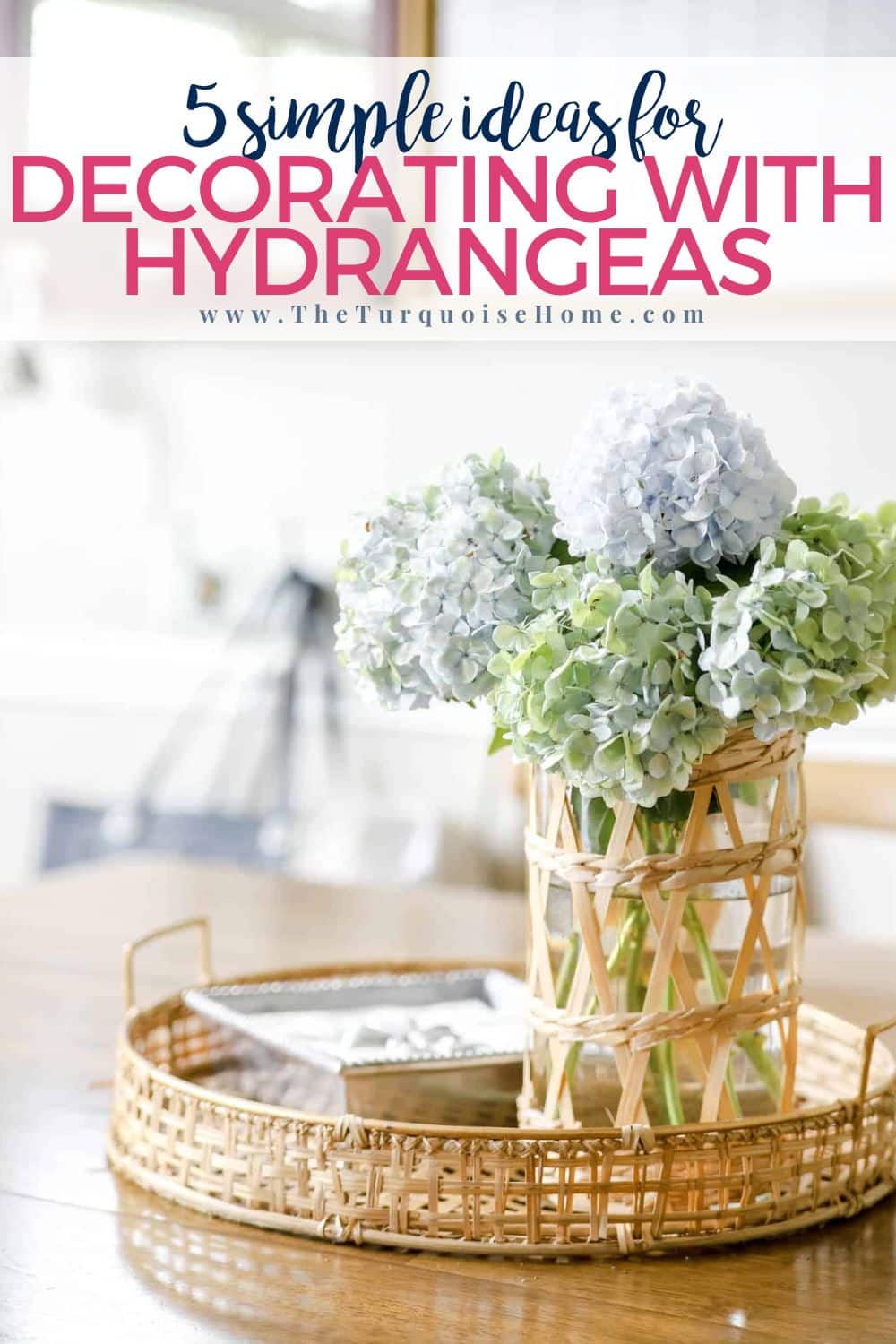 blue and white hydrangeas in a vase on a wooden table.