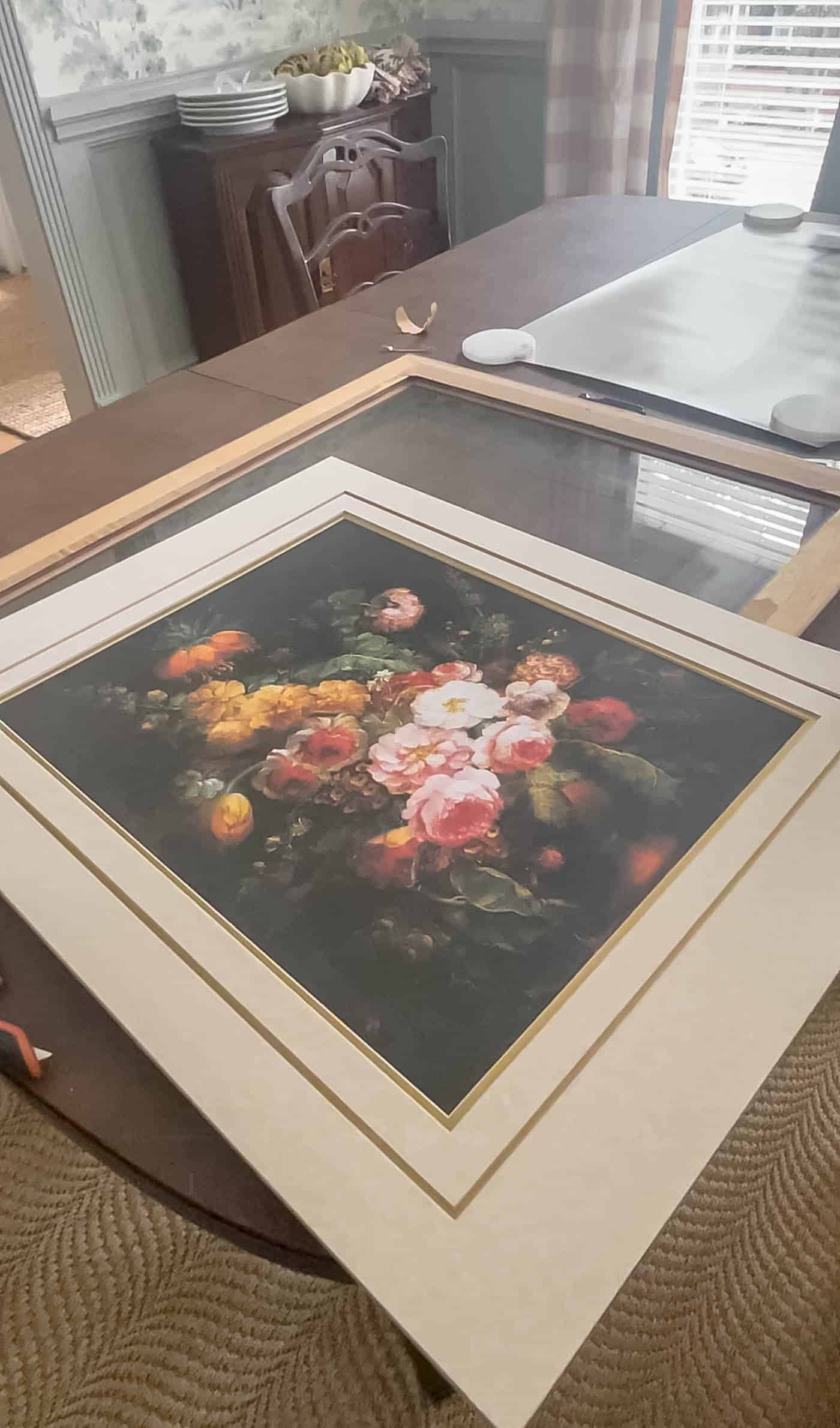disassembled old floral art and ornate frame.