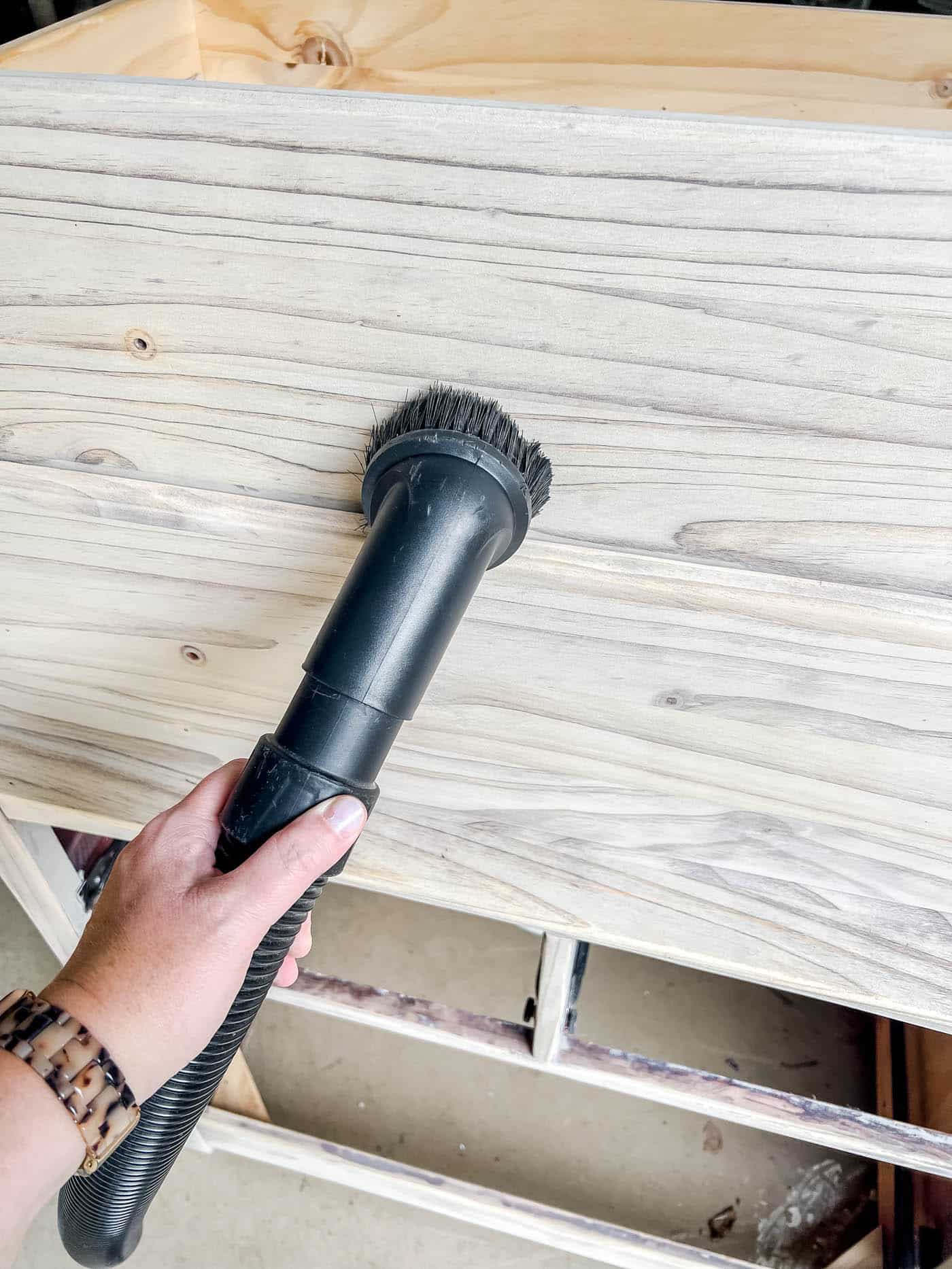 vacuum the furniture after sanding when you re-stain furniture.