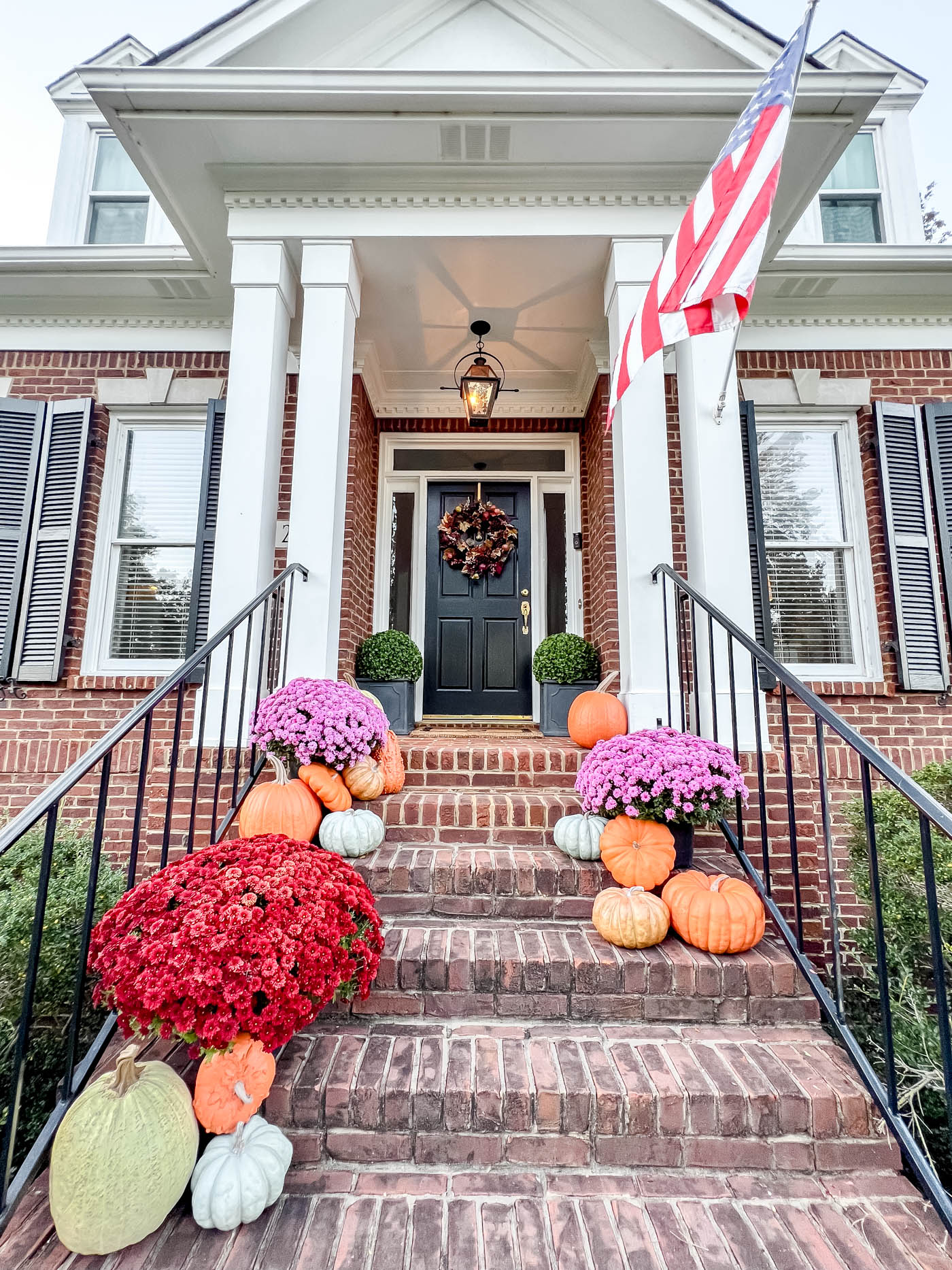 realistic fake pumpkins for outdoor fall decor.