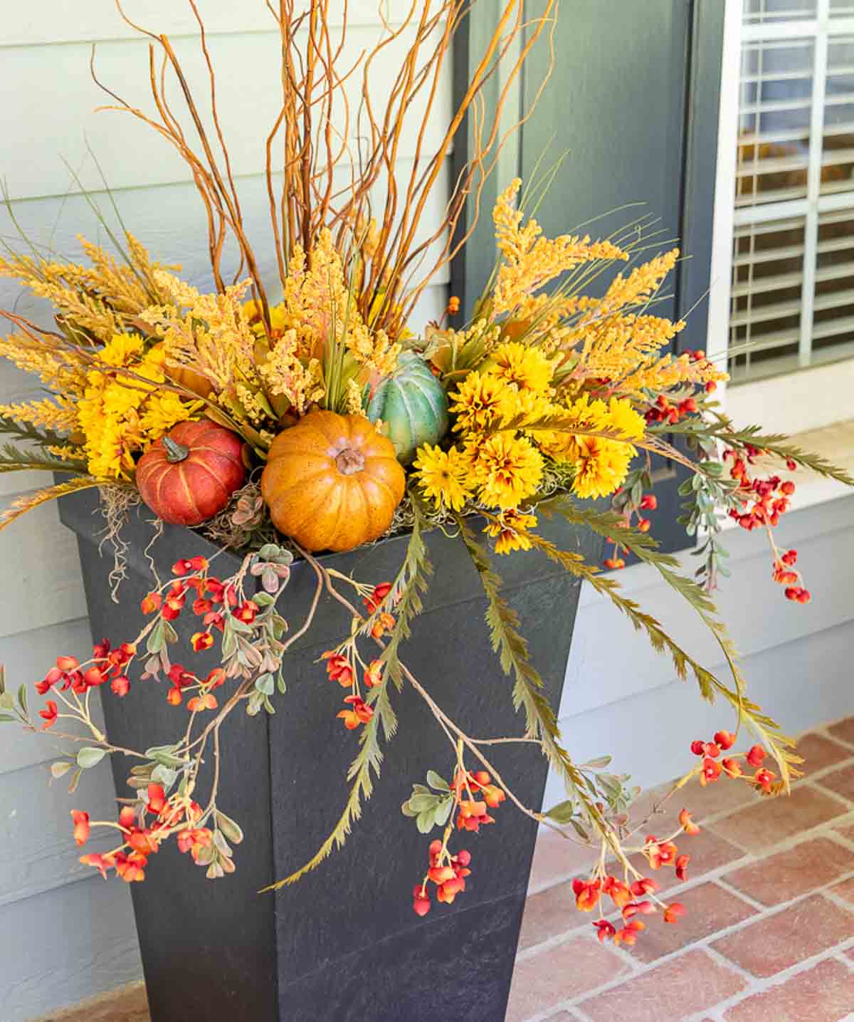 fall faux foliage in a planter