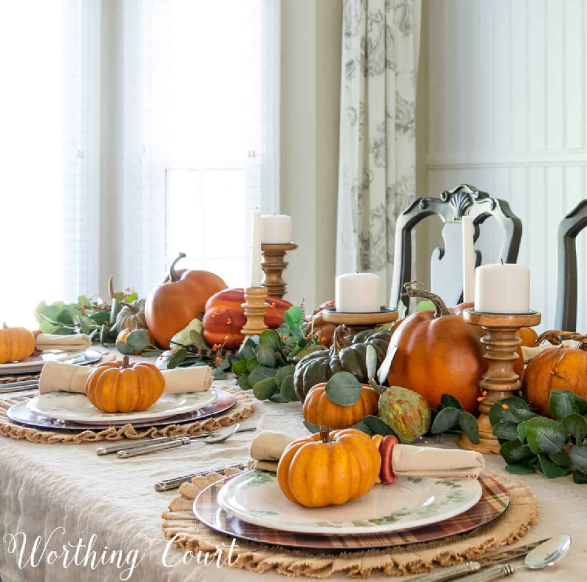 thanksgiving place settings with mini pumpkins