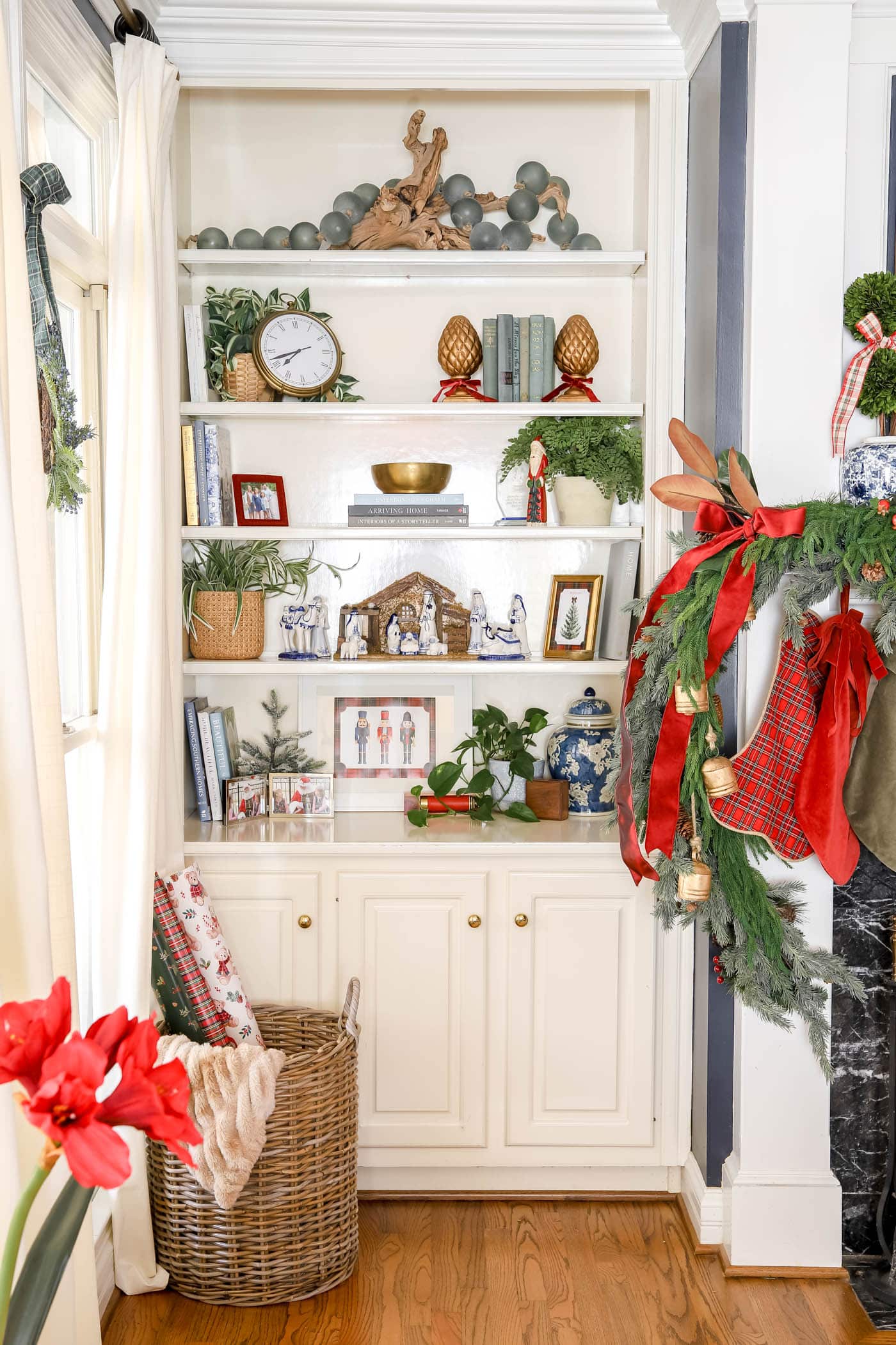 Ralph Lauren Christmas decor on a bookshelf.