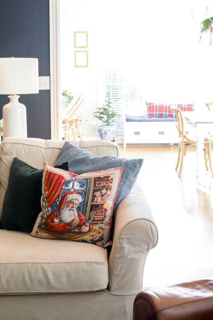 classic Santa throw pillow on sofa.