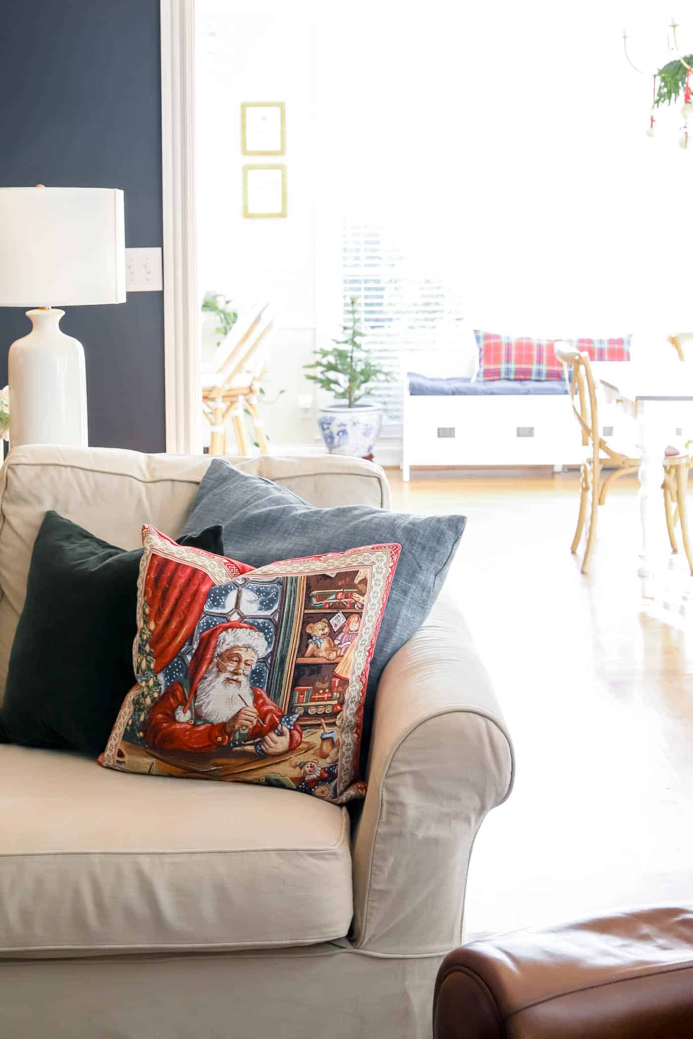 classic Santa throw pillow on sofa.