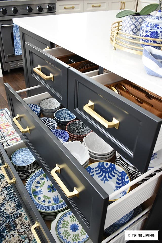kitchen drawers with blue and white dishes