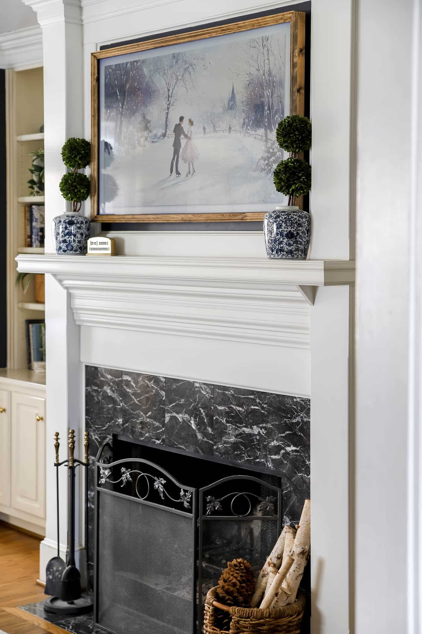 simple winter mantel with a Frame tv