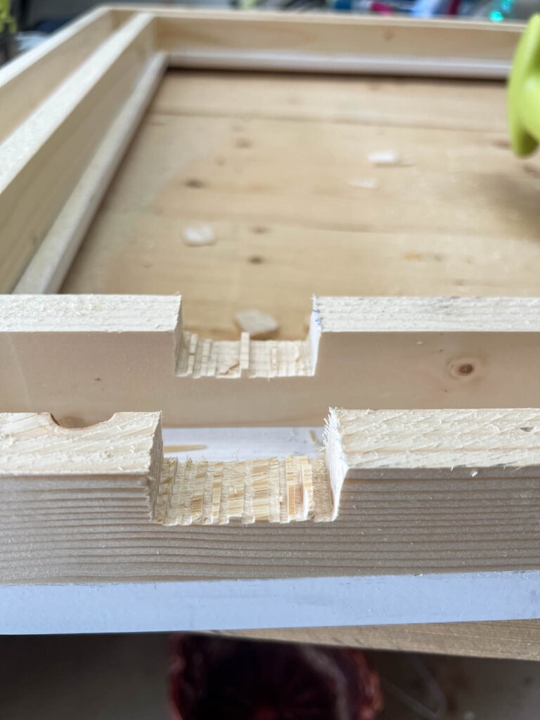 notched out board for the sensor for a Frame TV frame.