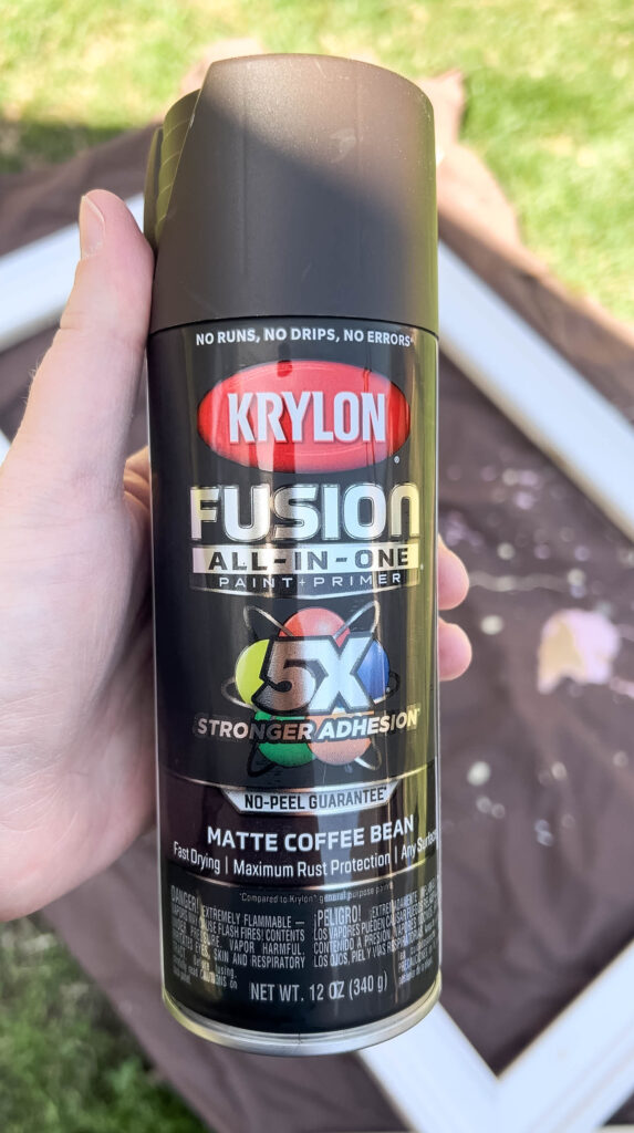Krylon spray paint in dark brown matte color.